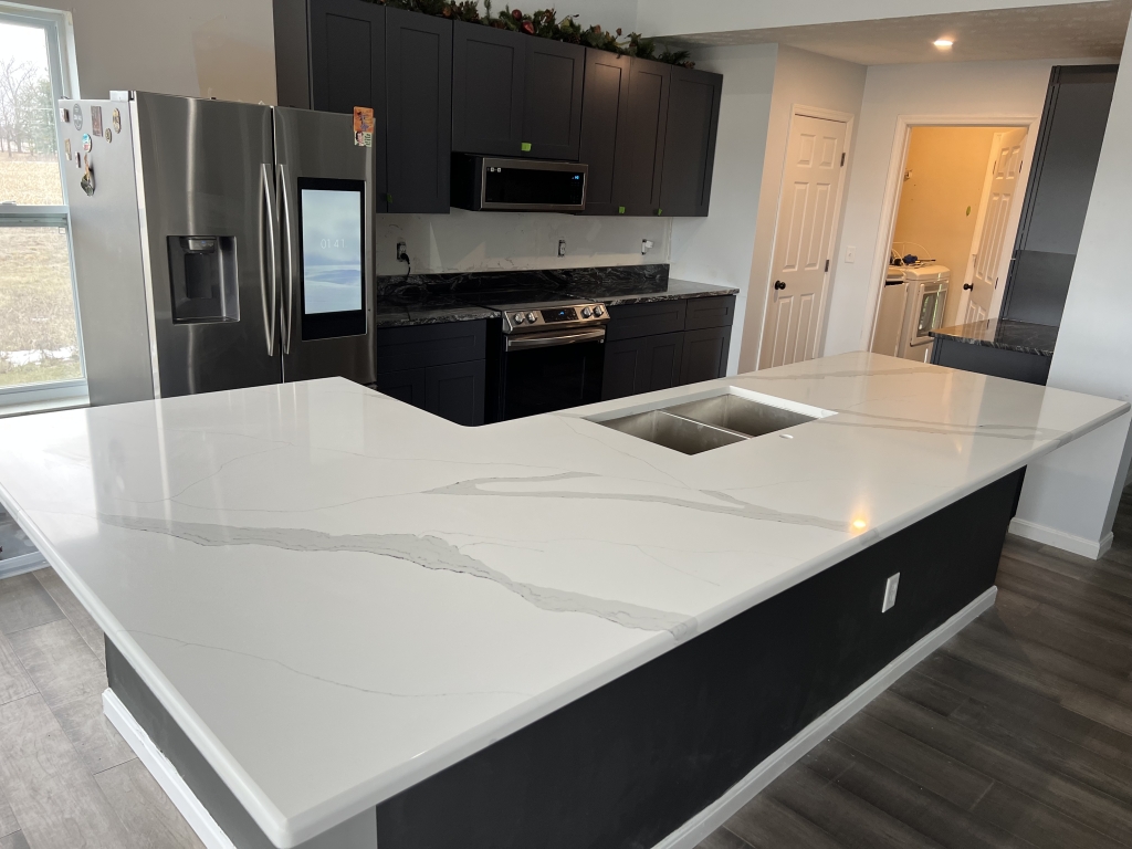 Silver Waves Granite and Blue Giza Quartz