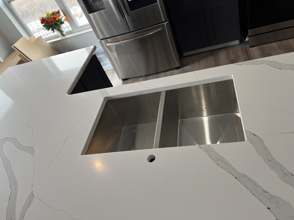 Silver Waves Granite and Blue Giza Quartz